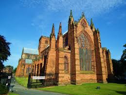 A scenic shot of Carlisle Castle or Carlisle Cathedral, highlighting the clean, well-kept surroundings that the city is known for.