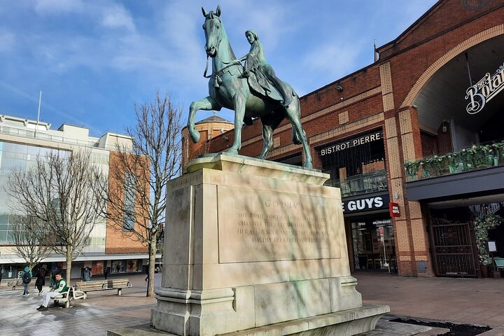 A scenic view of Coventry Cathedral or the Lady Godiva statue, showcasing clean and well-maintained surroundings.