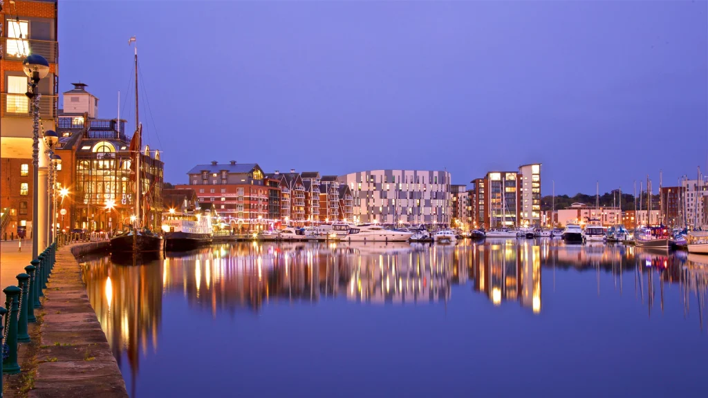 A clean and bright view of the Ipswich Waterfront, showcasing the marina and modern architecture.